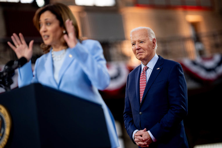 Kamala Harris standing at a lectern introduces Joe Biden during a campaign rally in Philadelphia, Pennsylvania.